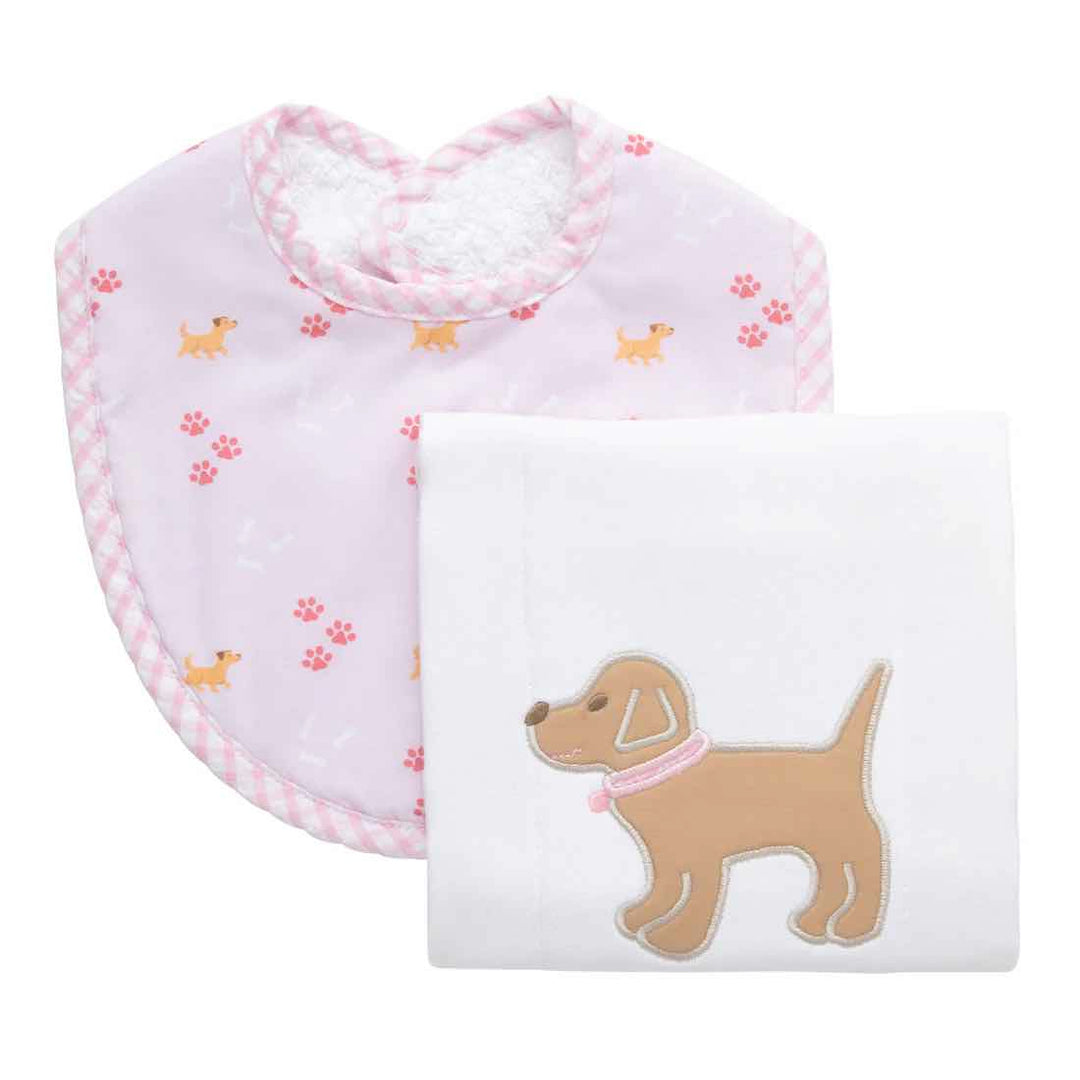 A set of pink lab-themed bib and burp cloths with an embroidered dog design.
